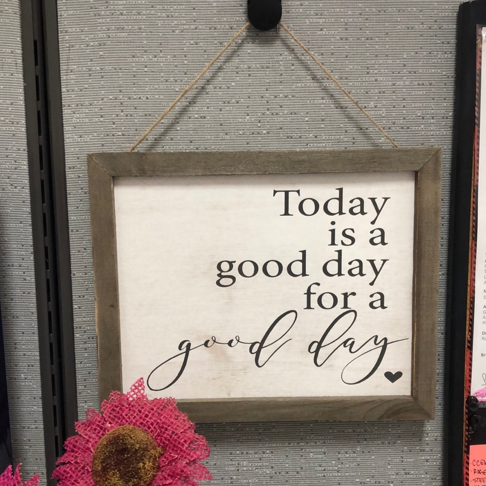 Handmade wooden sign with the phrase “Today is a good day for a good day”
